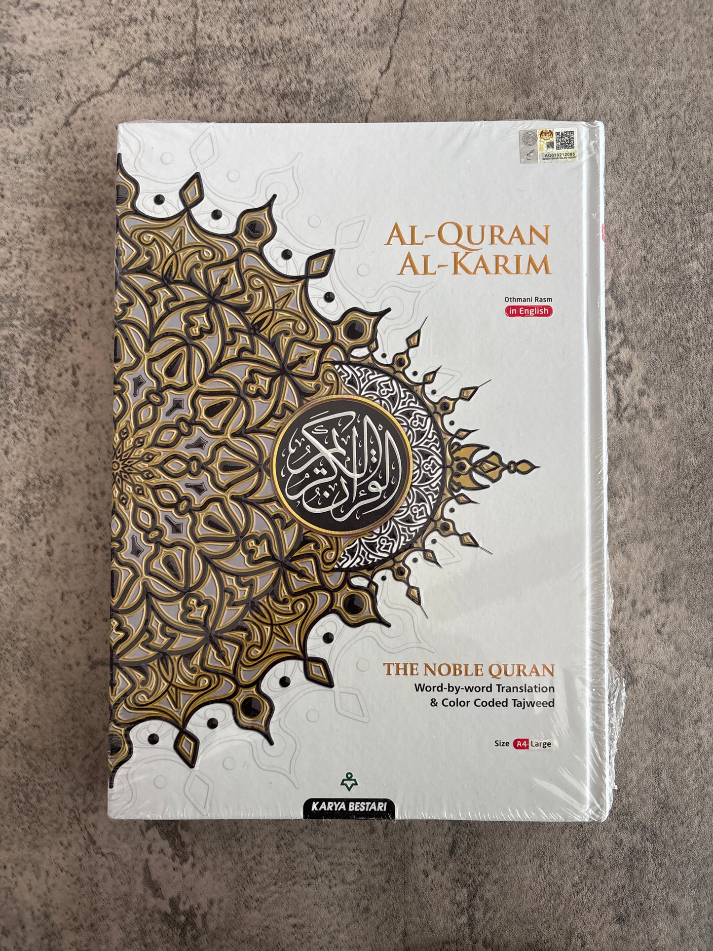 The Noble Quran - A4